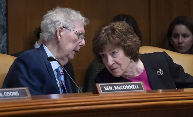Sen. Mitch McConnell, R-Ky., chair of the Senate Defense Appropriations Subcommittee, left, confers with Sen. Susan Collins, R-Maine, chair of the Senate Appropriations Committee, as they hear President Donald Trump's funding requests for the Army, at the Capitol in Washington, Tuesday, May 19, 2026. (AP Photo/J. Scott Applewhite)