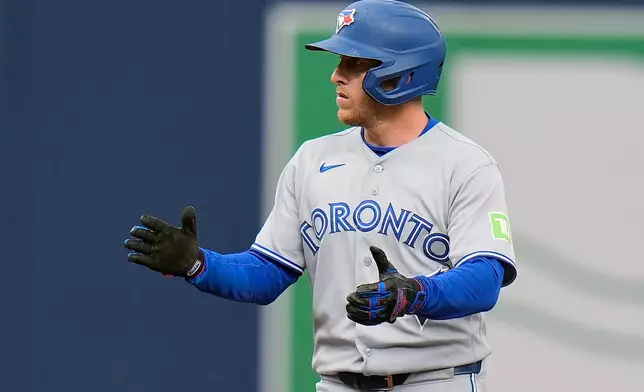 Toronto Blue Jays' Myles Straw celebrates after his double off Tampa Bay Rays pitcher Shane McClanahan during the fifth inning of a baseball game Wednesday, May 6, 2026, in St. Petersburg, Fla. (AP Photo/Chris O'Meara)