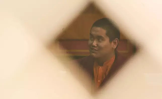 Jalue Dorje attends rituals at Dzarong Thubten Mindrol Dongä Monastery in Kathmandu, Nepal, Tuesday, April 14, 2026. (AP Photo/Niranjan Shrestha