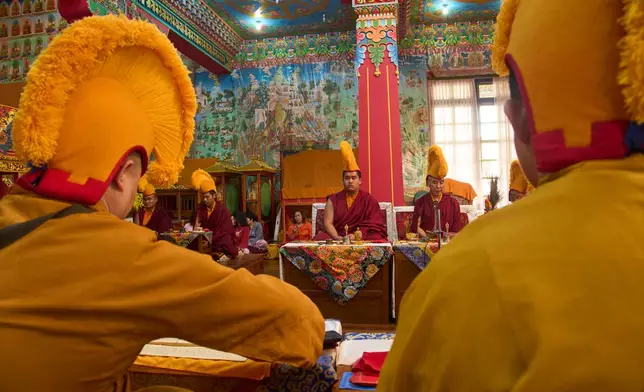 Jalue Dorje attends a ritual with other monks at Dzarong Thubten Mindrol Dongä Monastery in Kathmandu, Nepal, Tuesday, April 14, 2026. (AP Photo/Niranjan Shrestha)