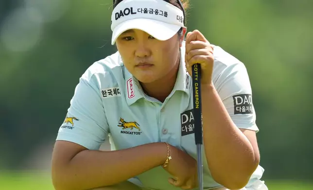 Haeran Ryu lines up her shot from the ninth hole during the final round of the Queen City Championship LPGA golf tournament, Sunday, May 17, 2026, in Cincinnati. (AP Photo/Jeff Dean)