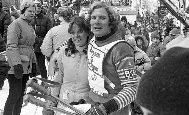 FILE - Claudine Longet and Vladimir "Spider" Sabich, right, appear at the Benson and Hedges Slalom Classic ski meet at Mount Snow in West Dover, Vt., on Jan. 6, 1974. (AP Photo/J. Walter Green, File)