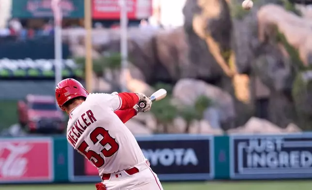Los Angeles Angels' Wade Meckler hits a three-run home run during the first inning of a baseball game against the Texas Rangers, Friday, May 22, 2026, in Anaheim, Calif. (AP Photo/Mark J. Terrill)