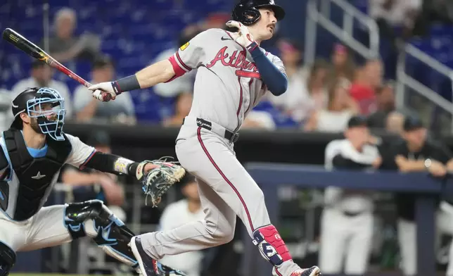 Atlanta Braves' Mike Yastrzemski hits a solo home run during the second inning of a baseball game against the Miami Marlins, Thursday, May 21, 2026, in Miami. (AP Photo/Lynne Sladky)