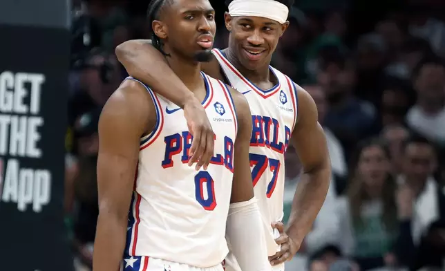 Philadelphia 76ers' Tyrese Maxey (left) and teammate VJ Edgecombe (right) during the second half of Game 7 in a first-round NBA basketball playoffs series, Saturday, May 2, 2026 in Boston. (AP Photo/Jim Davis)