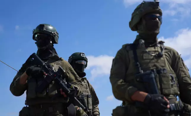 Israeli soldiers occupy a military position overlooking the so-called yellow line in the central Gaza Strip, Tuesday, May 26, 2026. (AP Photo/Ariel Schalit)