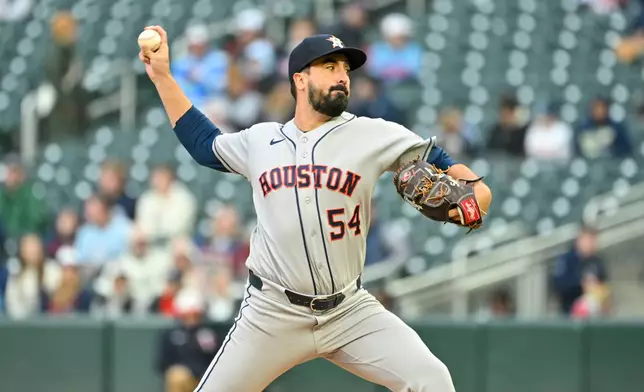 Houston Astros pitcher Jason Alexander (54) throws against the Minnesota Twins during the first inning of a baseball game Tuesday, May 19, 2026, in Minneapolis. (AP Photo/Craig Lassig)