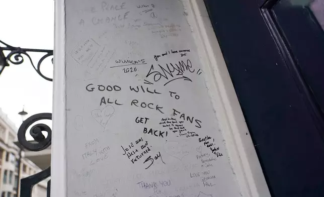 A view of a message written on the building in Savile Row where The Beatles held their last ever concert as a band, which is due to be turned into a fan museum in 2027, in London, Sunday, May 10, 2026. (AP Photo/Alberto Pezzali)