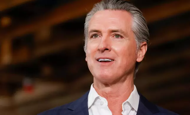 FILE - California Gov. Gavin Newsom speaks alongside local and state leaders during a news conference at BACS St. Regis Center in Hayward, Calif., March 2, 2026. (Jessica Christian/San Francisco Chronicle via AP, File)