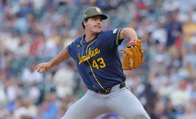 Milwaukee Brewers starting pitcher Logan Henderson delivers during the fifth inning of a baseball game against the Minnesota Twins, Saturday, May 16, 2026, in Minneapolis. (AP Photo/Bailey Hillesheim)