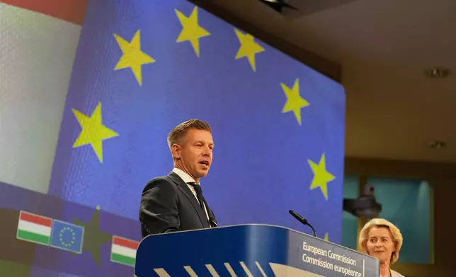 European Commission President Ursula von der Leyen, right, and Hungary's Prime Minister Peter Magyar address the media at EU headquarters in Brussels, Friday, May 29, 2026. (AP Photo/Virginia Mayo)