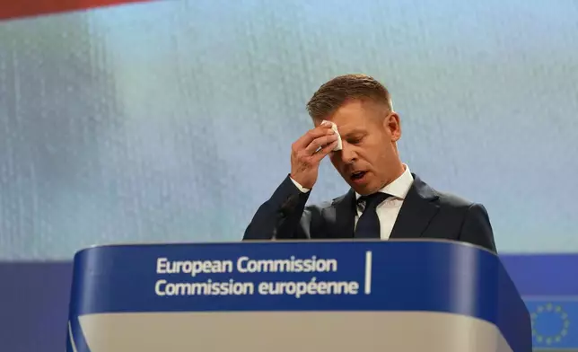 Hungary's Prime Minister Peter Magyar addresses the media at EU headquarters in Brussels, Friday, May 29, 2026. (AP Photo/Virginia Mayo)