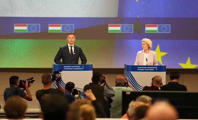European Commission President Ursula von der Leyen, right, and Hungary's Prime Minister Peter Magyar address the media at EU headquarters in Brussels, Friday, May 29, 2026. (AP Photo/Virginia Mayo)