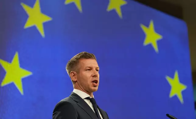 Hungary's Prime Minister Peter Magyar addresses the media at EU headquarters in Brussels, Friday, May 29, 2026. (AP Photo/Virginia Mayo)