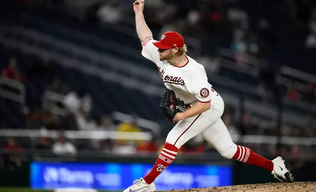 Washington Nationals pitcher Zak Kent throws during the ninth inning of a baseball game against the Minnesota Twins, Wednesday, May 6, 2026, in Washington. (AP Photo/Nick Wass)