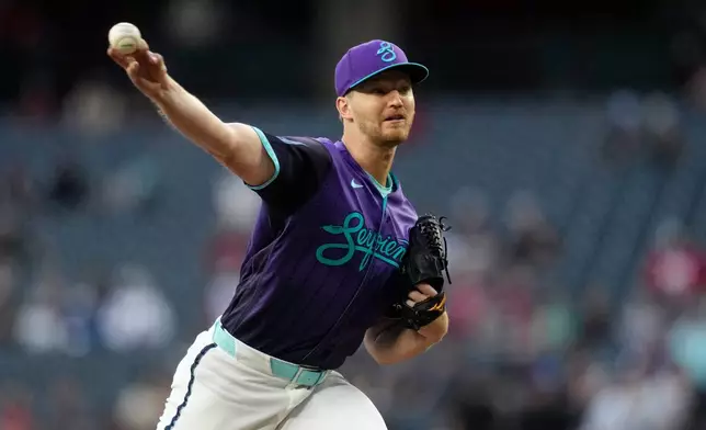 Arizona Diamondbacks starting pitcher Michael Soroka throws against the Colorado Rockies during the first inning of a baseball game, Friday, May 22, 2026, in Phoenix. (AP Photo/Ross D. Franklin)