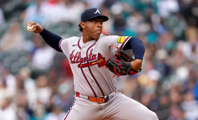 Atlanta Braves reliever Didier Fuentes delivers a pitch during the eighth inning of a baseball game against the Seattle Mariners, Wednesday, May 6, 2026, in Seattle. (AP Photo/Stephen Brashear)