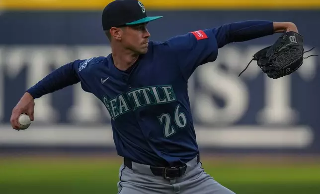 Seattle Mariners starting pitcher Emerson Hancock (26) warms up before a baseball game against the Chicago White Sox, Friday, May 8, 2026, in Chicago. (AP Photo/Erin Hooley)