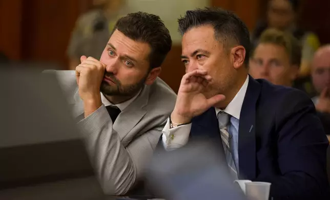 Dakota Mortensen, left, speaks with his attorney Joel Kittrell in Third District Court for a hearing regarding protective orders in Salt Lake City on Thursday, April 30, 2026. (Bethany Baker/The Salt Lake Tribune via AP, Pool)