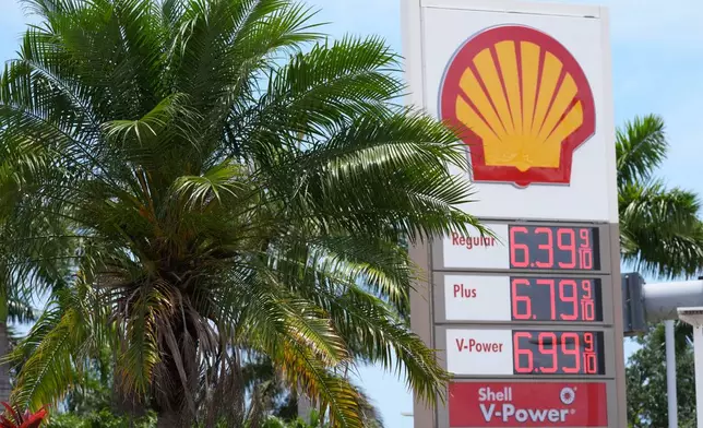 Gas prices are displayed at a Shell gas station in Miami, Tuesday, May 12, 2026. (AP Photo/Marta Lavandier)