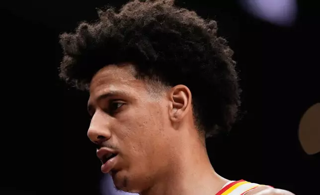 Atlanta Hawks forward Jalen Johnson (1) walks off the court during the first half of Game 4 in a first-round NBA playoffs basketball series against the New York Knicks Saturday, April 25, 2026, in Atlanta. (AP Photo/Brynn Anderson)
