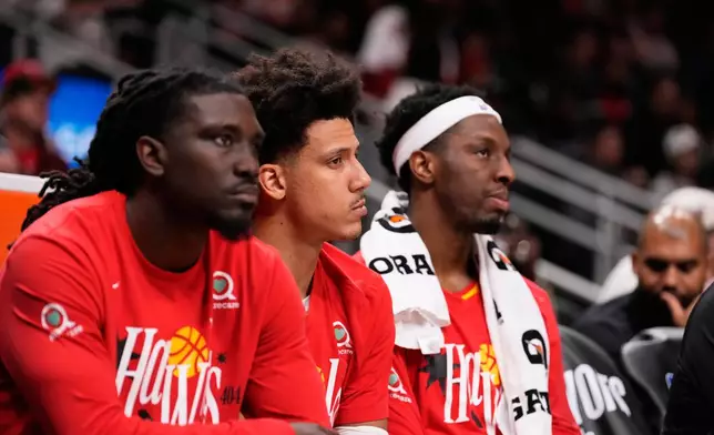 Atlanta Hawks forward Jalen Johnson (1) looks on after Game 6 in a first-round NBA basketball playoffs series against the New York Knicks Thursday, April 30, 2026, in Atlanta. (AP Photo/Brynn Anderson)