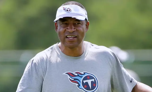 FILE - Tennessee Titans defensive coordinator Ray Horton, during an organized team activity at the team's NFL football training facility, June 10, 2015, in Nashville, Tenn. (AP Photo/Mark Humphrey, File)