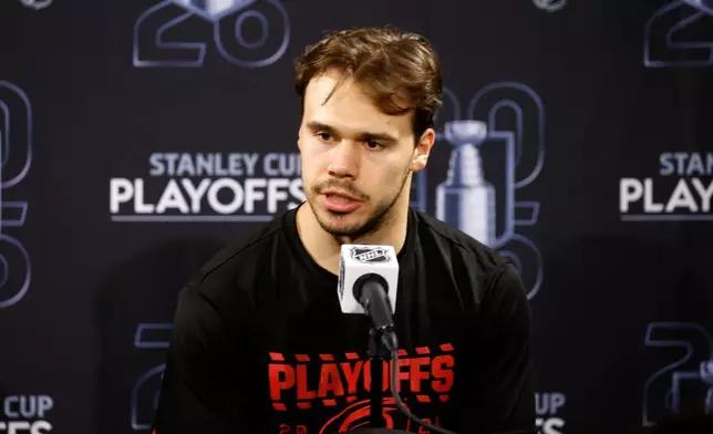 Carolina Hurricanes' Logan Stankoven speaks following Game 1 of an NHL hockey Stanley Cup second-round playoff series against the Philadelphia Flyers in Raleigh, N.C., Saturday, May 2, 2026. (AP Photo/Karl DeBlaker)