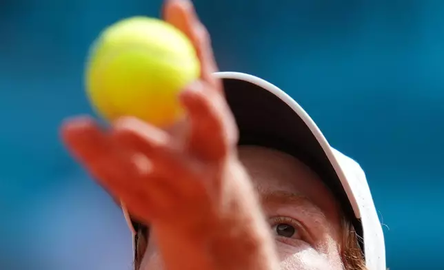 ALTERNATIVE CROP OF XGB103 - Jannik Sinner, of Italy, serves the ball to Alexander Zverev, of Germany, during their men's singles tennis final match at the Madrid Open tennis tournament in Madrid, Spain, Sunday, May 3, 2026. (AP Photo/Manu Fernandez)