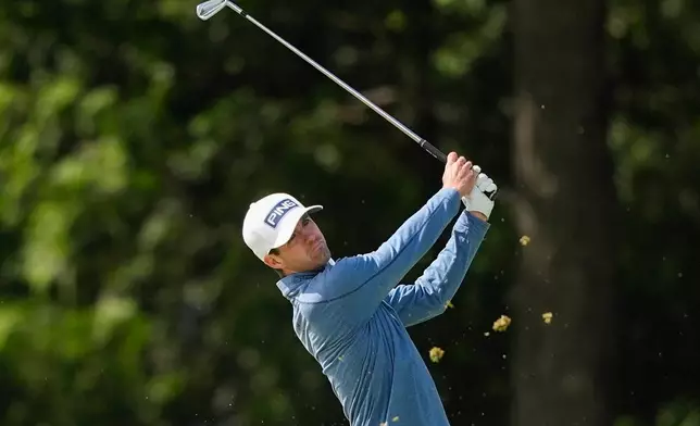 Alex Smalley hits from the 13th fairway during the second round of the PGA Championship golf tournament at Aronimink Golf Club, Friday, May 15, 2026, in Newtown Square, PA. (AP Photo/Carolyn Kaster)