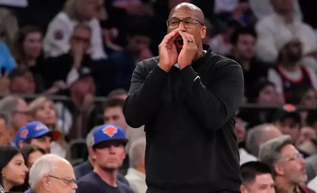 New York Knicks head coach Mike Brown screams during the first half of Game 2 in a second-round NBA basketball playoffs series against the Philadelphia 76ers, Wednesday, May 6, 2026, in New York. (AP Photo/Yuki Iwamura)