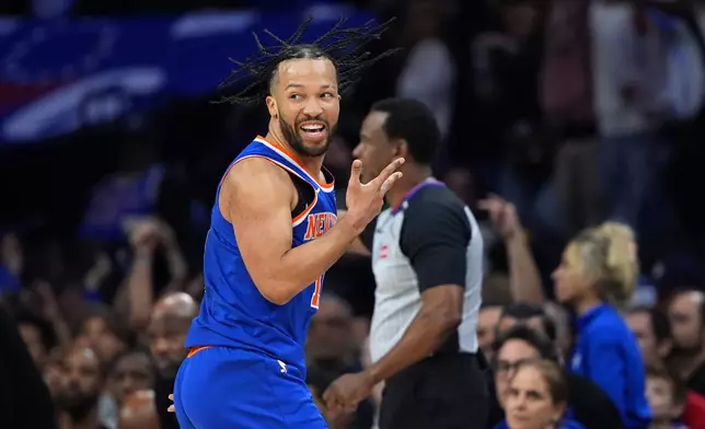 New York Knicks' Jalen Brunson reacts after scoring during the second half of Game 4 against the Philadelphia 76ers in a second-round NBA basketball playoffs series Sunday, May 10, 2026, in Philadelphia. (AP Photo/Matt Slocum)