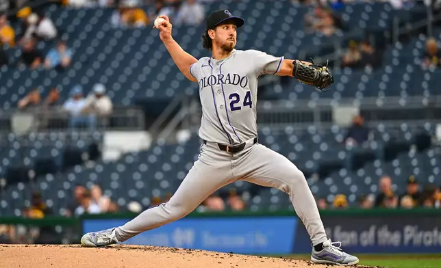 Colorado Rockies pitcher Michael Lorenzen delivers during the first inning of a baseball game against the Pittsburgh Pirates in Pittsburgh, Tuesday, May 12, 2026. (AP Photo/Justin Berl)