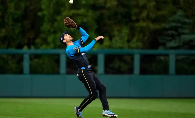 Philadelphia Phillies shortstop Trea Turner catches a fly out by Cleveland Guardians' Petey Halpin during the sixth inning of a baseball game Friday, May 22, 2026, in Philadelphia. (AP Photo/Matt Slocum)