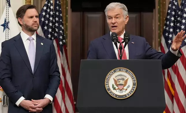 Vice President JD Vance listens as Centers for Medicare &amp; Medicaid Services Administrator Dr. Mehmet Oz speaks to the media from the Eisenhower Executive Office Building on the White House campus, Wednesday, May 13, 2026, in Washington. (AP Photo/Jacquelyn Martin)