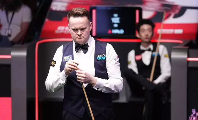 England's Shaun Murphy during his match against China's Wu Yize on day sixteen of the World Snooker Championship 2026 in Sheffield, England, Sunday, May 3, 2026. (Mike Egerton/PA via AP)