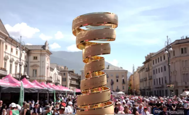 The Giro d'Italia's trophy is on display ahead of the 14th stage of the Giro d'Italia cycling race, from Aosta to Pila, Italy, Saturday, May 23, 2026. (Massimo PaoloneLaPresse via AP)