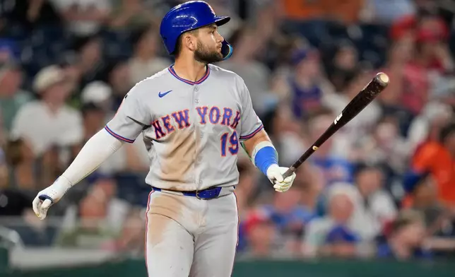New York Mets' Bo Bichette watches his home run against the Washington Nationals during the seventh inning of a baseball game, Monday, May 18, 2026, in Washington. (AP Photo/Jess Rapfogel)
