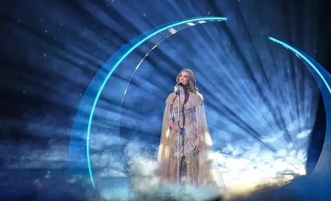 Delta Goodrem from Australia performs the song "Eclipse" during the Grand Final of the 70th Eurovision Song Contest in Vienna, Austria, Saturday, May 16, 2026. (AP Photo/Martin Meissner)
