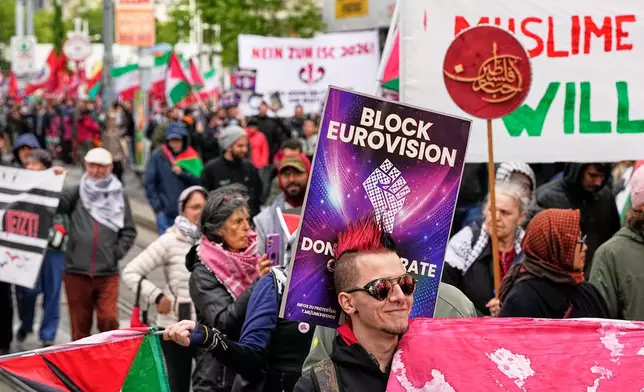 Demonstrators protest against Israel ahead of the Grand Final of the 70th Eurovision Song Contest in Vienna, Austria, Saturday, May 16, 2026. (AP Photo/Martin Meissner)