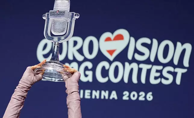 Dara from Bulgaria attends a press conference with the trophy after winning the Grand Final of the 70th Eurovision Song Contest in Vienna, Austria, Sunday, May 17, 2026, she won with the song "Bangaranga".(AP Photo/Martin Meissner)