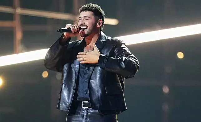 Noam Bettan from Israel performs the song "Michelle" during the Grand Final of the 70th Eurovision Song Contest in Vienna, Austria, Saturday, May 16, 2026. (AP Photo/Martin Meissner)