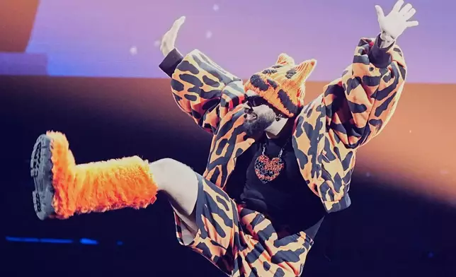 Akylas from Greece performs the song "Ferto" during the dress rehearsal for the Grand Final of the 70th Eurovision Song Contest in Vienna, Austria, Friday, May 15, 2026. (AP Photo/Martin Meissner)