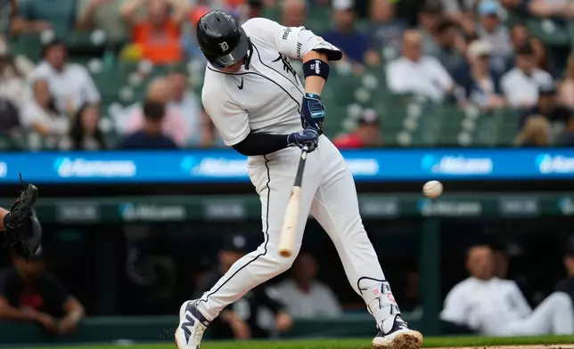 Detroit Tigers' Spencer Torkelson hits a two-run home run against the Cleveland Guardians during the second inning of a baseball game Tuesday, May 19, 2026, in Detroit. (AP Photo/Paul Sancya)