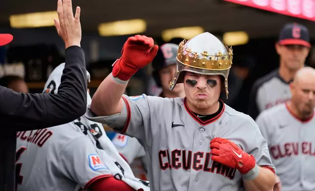 Cleveland Guardians' Travis Bazzana celebrates his two-run home run against the Detroit Tigers during the fourth inning of a baseball game Tuesday, May 19, 2026, in Detroit. (AP Photo/Paul Sancya)
