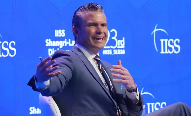 U.S. Defense Secretary Pete Hegseth gestures as he speaks during the Shangri-La Dialogue, Asia's annual defense and security forum, in Singapore, Saturday, May 30, 2026. (AP Photo/Achmad Ibrahim)