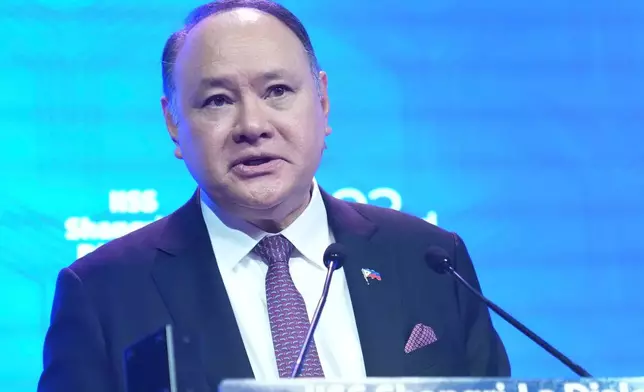 Philippine's Defense Secretary Gilberto Teodoro delivers his address during the Shangri-La Dialogue, Asia's annual defense and security forum, in Singapore, Sunday, May 31, 2026. (AP Photo/Achmad Ibrahim)