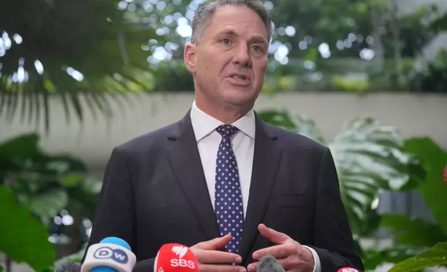 Australian Defense Minister Richard Marles talks to journalists during the Shangri-La Dialogue, Asia's annual defense and security forum, in Singapore, Sunday, May 31, 2026. (AP Photo/Achmad Ibrahim)