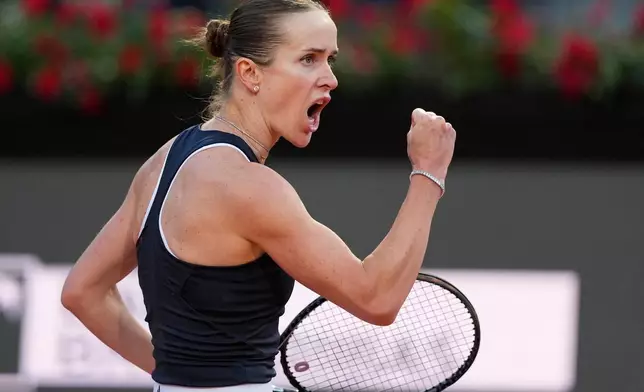 Ukraine's Elina Svitolina celebrates a winning point as she plays against United States' Coco Gauff during their women's final match at the Italian Open tennis tournament in Rome, Saturday, May 16, 2026. (AP Photo/Alessandra Tarantino)