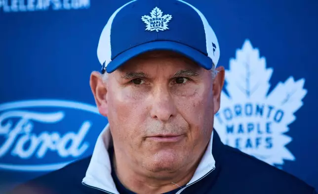 FILE - Toronto Maple Leafs head coach Craig Berube speaks to media during NHL hockey training camp in Toronto, Sept. 18, 2025. (Sammy Kogan/The Canadian Press via AP, File)